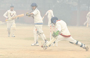 Players in action during the Saupin's League Cricket Competition at Sector 48 in Chandigarh.