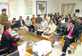 Raj Shri Singh, SP, holds a meeting with school principals at Rewari. 