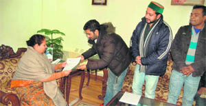 Members of the state Youth Congress submit a memorandum to Governor Urmila Singh at the Raj Bhawan in Shimla on Thursday. 