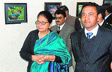 Governor NN Vohras wife Usha Vohra along with Minister for Tourism Nawang Rigzin Jora at a photography exhibition in Jammu on Thursday