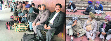 Passengers have a harrowing time waiting for hours at the Ludhiana railway station on Thursday; Farmers squatting on railway tracks. 