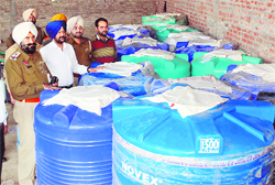 A team of the CIA Staff seizes a large quantity of illicit liquor at Muddal village in Amritsar.