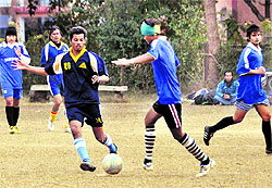 A match in the Ram Bahadur Chhetri Memorial Football Tournament under way in Dehradun on Friday