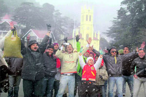 With the cold wave intensifying, tourists have fun in Shimla on Friday. 