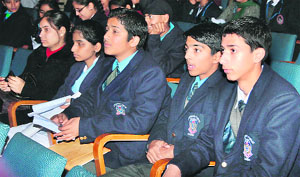Students at a symposium on road safety organised by the Motor Vehicle Department at Government College for Women, Gandhi Nagar, in Jammu on Friday. 
