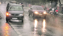 Showers hit Jalandhar on Friday, forcing residents to stay indoors. Only a few vehicles were seen on the roads.