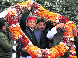 Samajwadi Party's UP chief Akhilesh Yadav being garlanded by supporters in Moradabad on Friday. 