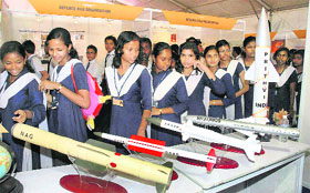 Schoolchildren at an exhibition of missiles at the Science Congress on Friday.