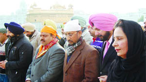 Anil Joshi, Tarun Chugh, Navjot Kaur and Inderbir Bolaria, accompanied by BJP MP Navjot Singh Sidhu, pay obessiance at the Golden Temple in Amritsar on Saturday. 