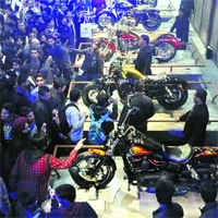 A crowded Harley Davidson pavilion at the Auto Expo.