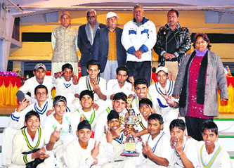 The Punjab team with the 26th Banke Lal Shah Under-15 Memorial Cricket Tournament trophy in Dehradun on Saturday. 