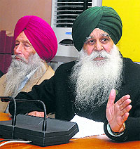 Bharatiya Kisan Union president Ajmer Singh Lakhowal addresses a press conference in Jalandhar on Saturday
