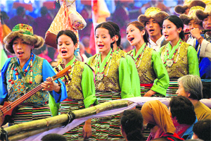 A group of devotees performs on Day 7 of the Buddhist festival Kalchakra in Bodh Gaya on Saturday. 