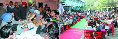 Government servants, who would be performing election duty, being given a demonstration on operating electronic voting machines at the Government Polytechnic College in Bathinda on Sunday;  the members of the polling staff attend the first rehearsal ahead of Assembly elections. 