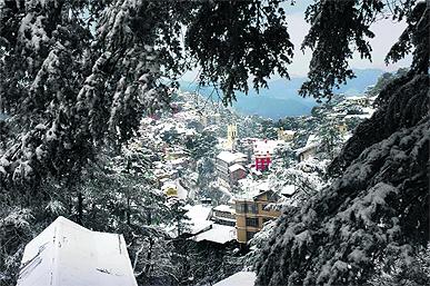Shimla town after fresh snow on Sunday.