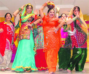 Members of the Gitanjali Ladies Club celebrate Lohri in Ludhiana.