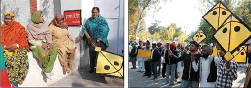 (Left) A woman follower of the Peoples Party of Punjab holds a kite, the partys election symbol, outside the residence of the SSP, Bathinda, on Monday; PPP supporter holding the party symbol when Manpreet Badal was on his way to Bathinda file his nomination papers from Maur. 