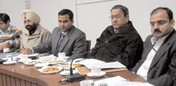 Expenditure observers hold a meeting with the district officials in Bathinda on Monday. 