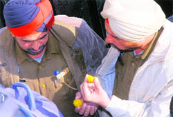 A 'laddoo' was too tasty to resist for these policemen accompanying a candidate during the filing of nomination in Jalandhar.