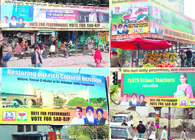 Posters of the SAD-BJP alliance on the rooftop bus shelters at Chheharta Chowk and unipoles near the railway station in Amritsar.