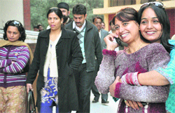 A mother in a jubilant mood (on phone) with her sister as her son got admission, while others were sad as their wards fail to make it at St Annes School in Chandigarh