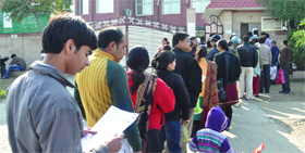 Parents queue up at Queen Mary'School, Northend, New Delhi, to submit nursery admission forms of their wards on Tuesday.