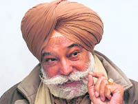 People's Party of Punjab candidate Bir Devinder Singh makes a point at a press conference in Mohali on Tuesday. 