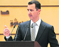 Syrian President Bashar al-Assad delivers a speech on Tuesday.