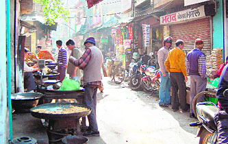 Shopkeepers encroach upon a narrow street inside Lohgarh Gate in Amritsar. 