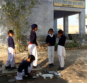 Primary school students at Mohar Jamsher being made to wash the utensils and cups after the teachers had their tea on Wednesday