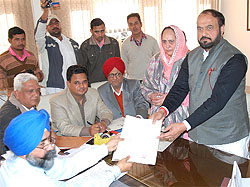 Congress candidate from the Bathinda (Urban) Assembly constituency Harminder Singh Jassi files his nomination papers before the returning officer in Bathinda on Wednesday