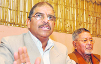 Rajendra Pant announces his decision to fight the Assembly poll as a Uttarakhand Raksha Morcha candidate in Dehradun on Wednesday. A Tribune photographg to the ruling BJP and two to the Congress and one to the UKD(P) - were among the 19 candidates who filed their nomination papers today in four districts, returning officers from these districts informed.