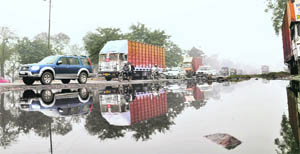 Accumulation of water along the National Highway-2 near Sector 20 in Faridabad is a common sight owing to poor drainage. 