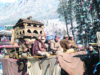 A tableau during a procession on the opening day of the Winter Carnival in Manali on Monday.