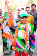 A minor campaigns for Congress candidate Jasbir Singh Dimpa from Amritsar