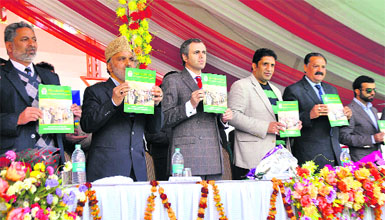 Chief Minister Omar Abdullah along with Cabinet ministers releases the report card of the achievements of his government in Jammu on Wednesday. 