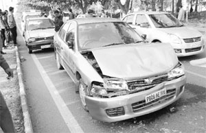 Cars that met with an accident on the road separating Sectors 21 and 34 in Chandigarh on Thursday. 