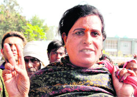 Madam Sonia candidate of Nationalist Panther Party from Haridwar city shows victory sign after filing her nomination on Thursday in Haridwar.