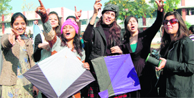Students of Shahzada Nand College fly kites to celebrate Lohri in Amritsar on Friday.