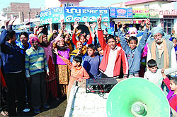 Irate over the blocked sewer in their locality, residents of Parasram Nagar hold protest against the authorities of the Municipal Corporation in Bathinda on Friday