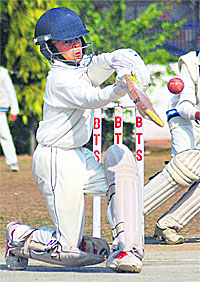 A player in action during the 4th Vivek Cricket Trophy at Sector 48 in Chandigarh on Friday.