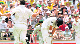 Gautam Gambhir is dismissed by Ben Hilfenhaus (L) in Perth on Friday.