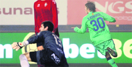 Barcelona's Sergi Roberto (R) celebrates after scoring against Osasuna in the Spanish Cup on Friday.
