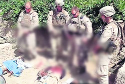 A still from an undated YouTube video shows US Marines urinating on the bodies of dead Taliban soldiers in Afghanistan