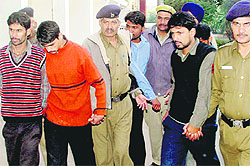 Accused in the Harminder Singh murder case being produced in the District Courts, Sector 17, Chandigarh, on Saturday
