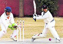 A player in action during the 4th Vivek Cricket Trophy at Banyan Tree School, Sector 48, Chandigarh, on Saturday