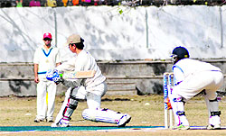 Players in action in a match in the 4th Uttarakhand Shaheed Girish Bhadri Cricket Tournament in Dehradun on Saturday