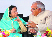 President Pratibha Devi Singh Patil talks with Chief Minister Bhupinder Singh Hooda during the Shourya Diwas function to commemorate the 251st anniversary of the third Battle of Panipat in Kala Amb on Saturday.