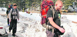 Foreigners caught in a fresh spell of snow in Dharamkot, 20 km from Dharamsala, on Saturday.