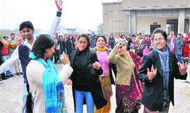 Students dance at the farewell party of the Directorate of Distance Education, University of Jammu